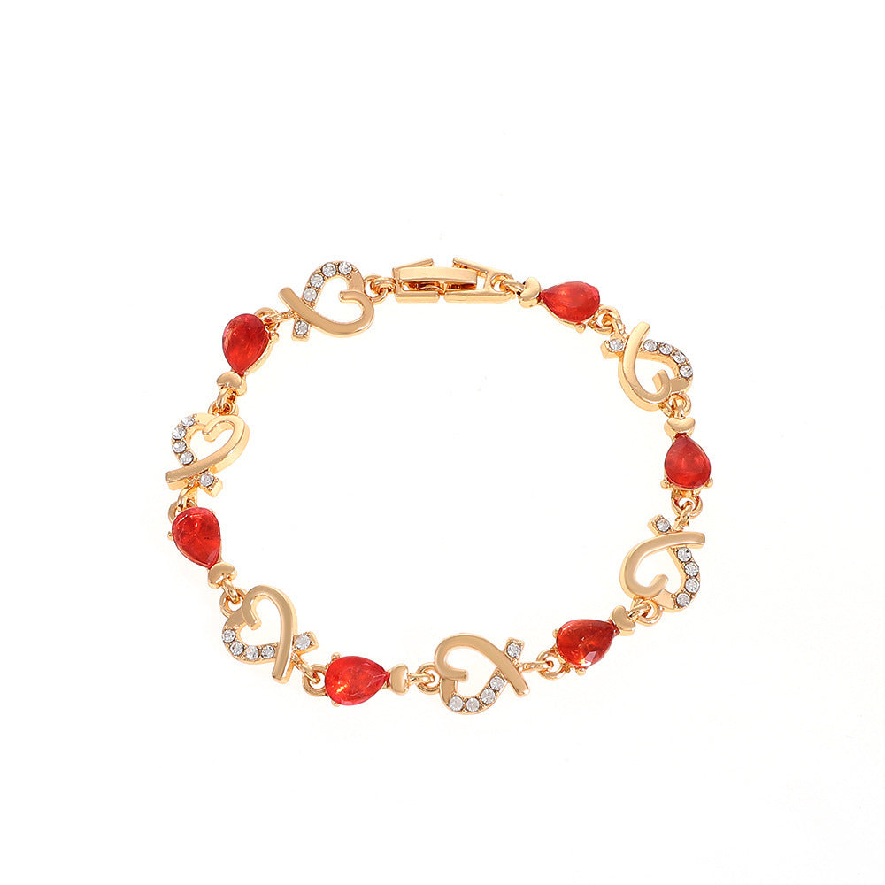 Pulsera de aleación de diamantes de flor hueca de corazón al por mayor